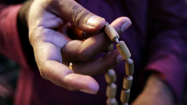 Chanting Hare Krishna attentively with Absorption